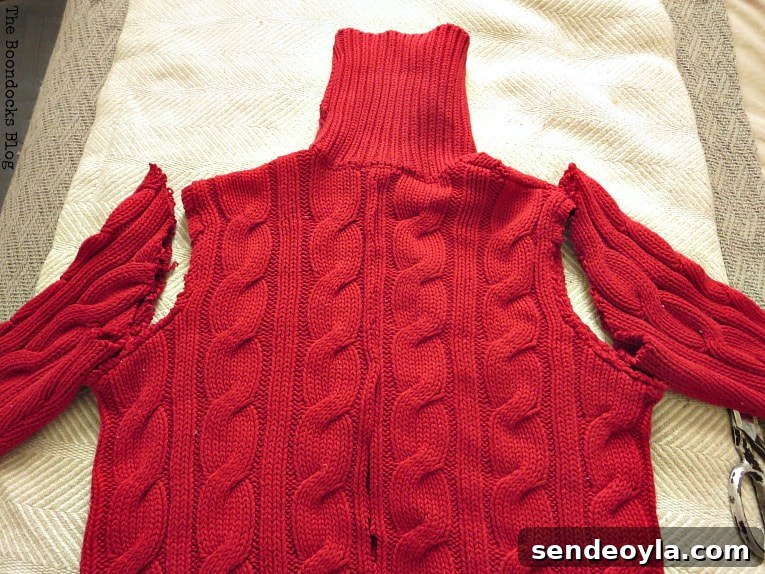 How to Make Christmas Stockings from Old Sweaters 3 cutting the sleeves of the sweater, How to Make Easy Christmas Stockings from Sweaters