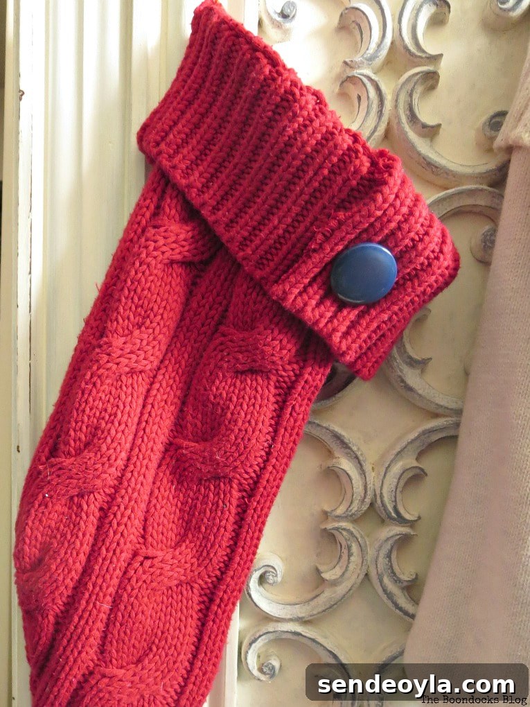 How to Make Christmas Stockings from Old Sweaters 9 blue button on other red stocking, How to Make Easy Christmas Stockings from Sweaters