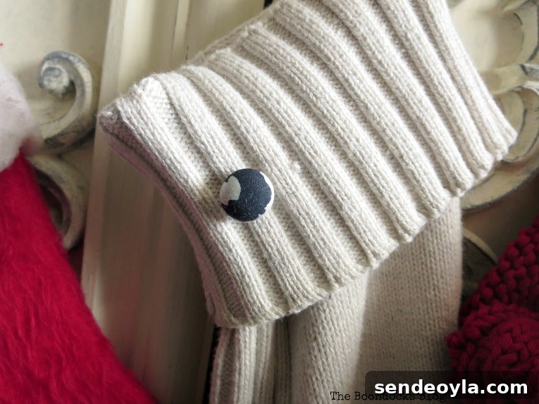 How to Make Christmas Stockings from Old Sweaters 10 black and white button on white stocking, How to Make Easy Christmas Stockings from Sweaters