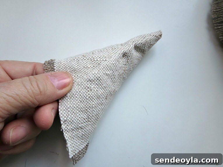 DIY Mini Christmas Tree from Dollar Store Fabric 9 Piece of fabric shaped like a cone.