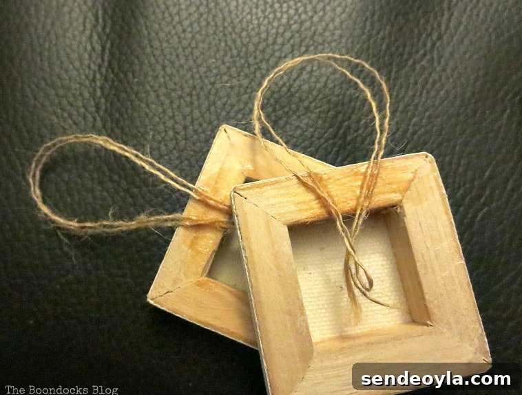 DIY Snowflake Mini Canvas Ornaments for Holiday Decor 5 Back of mini canvas with glued on twine, How to Make Easy Snowflake Mini Canvas Ornaments www.theboondocksblog.com