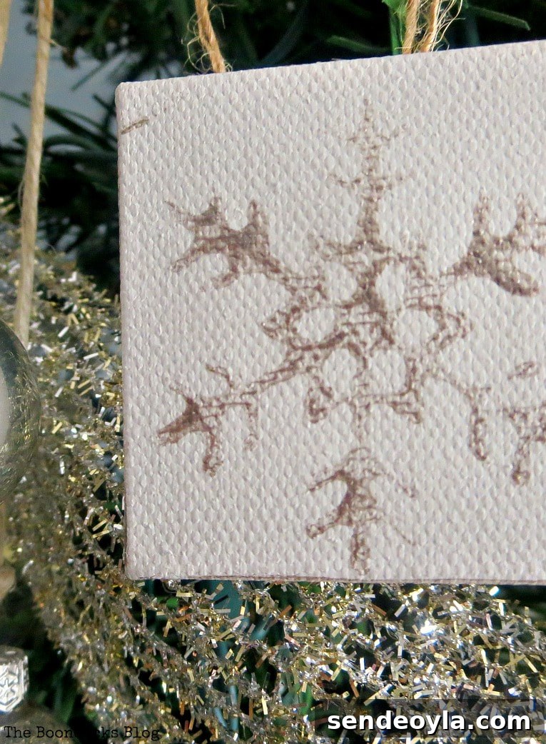 DIY Snowflake Mini Canvas Ornaments for Holiday Decor 6 mini canvas with snowflake design, How to Make Easy Snowflake Mini Canvas Ornaments www.theboondocksblog.com
