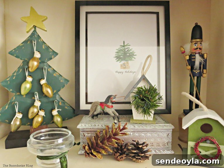 Upcycle Old Decor into Bright Christmas Vignettes 11 Green composition on bookcase, How to Reuse Old Decor to Make Bright Christmas Vignettes www.theboondocksblog.com