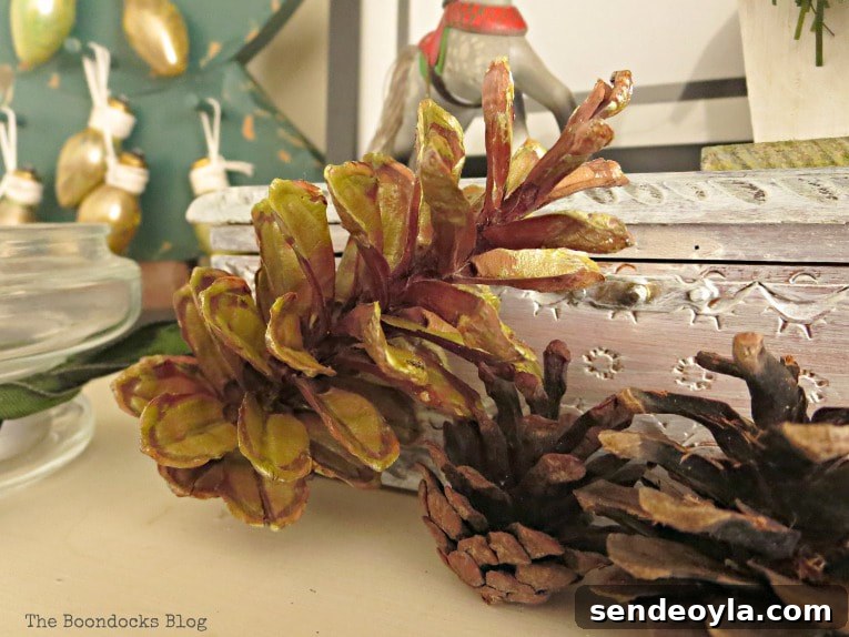 Upcycle Old Decor into Bright Christmas Vignettes 13 Gold painted pine cones, How to Reuse Old Decor to Make Bright Christmas Vignettes www.theboondocksblog.com