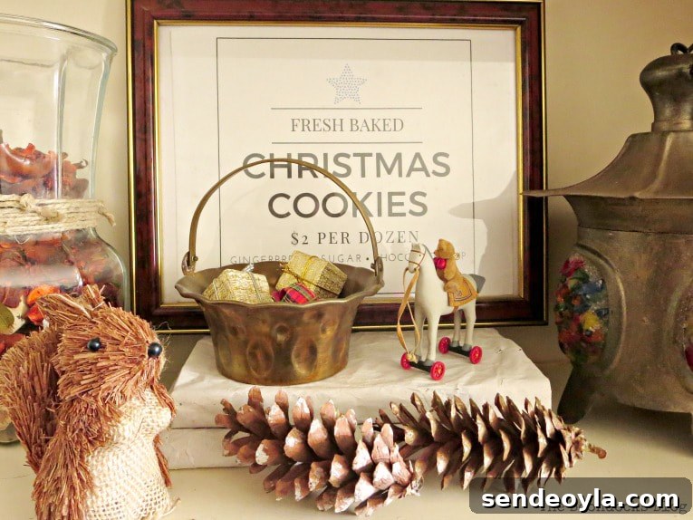 Upcycle Old Decor into Bright Christmas Vignettes 16 Brown picture frame and brass basket, How to Reuse Old Decor to Make Bright Christmas Vignettes www.theboondocksblog.com