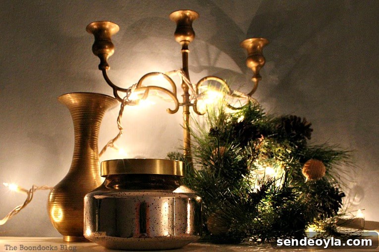 Upcycle Old Decor into Bright Christmas Vignettes 20 top of bookcase with candelabra, wreath, jar and vase, How to Reuse Old Decor to Make Bright Christmas Vignettes www.theboondocksblog.com