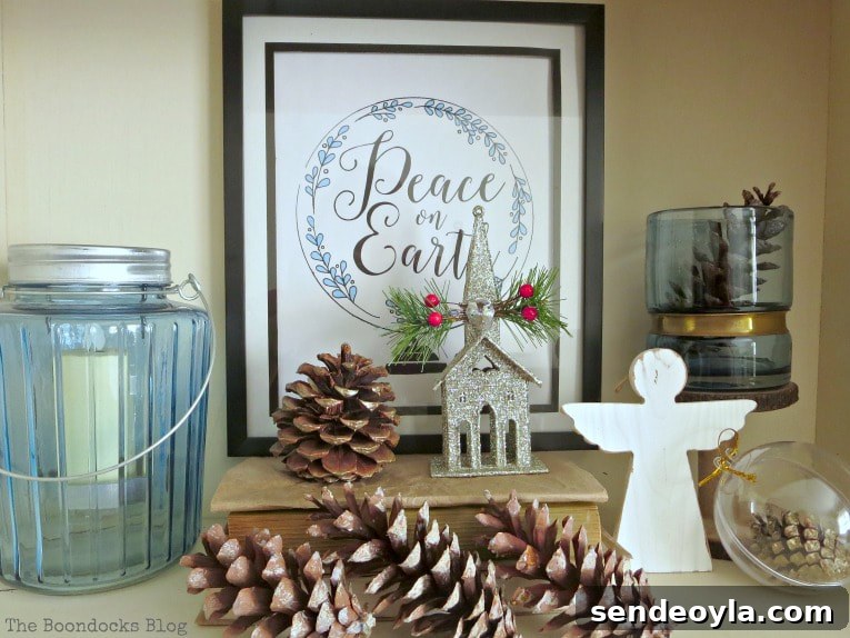Upcycle Old Decor into Bright Christmas Vignettes 3 blue and white decor with picture frame, How to Reuse Old Decor to Make Bright Christmas Vignettes www.theboondocksblog.com