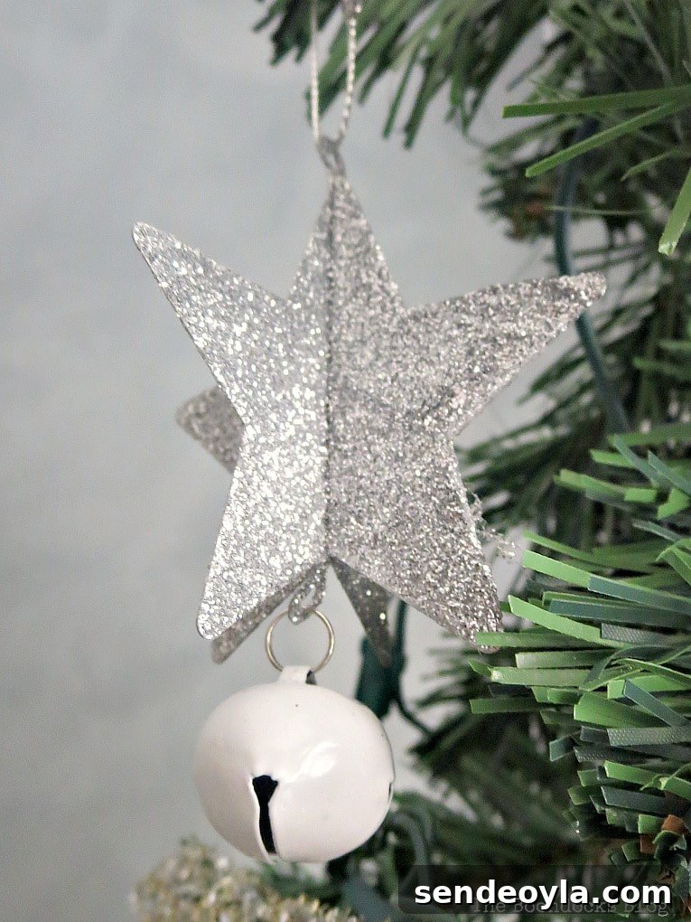 Glitter star with white bell ornament