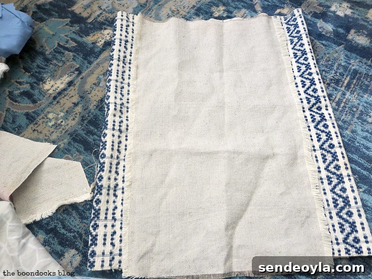 DIY Throw Pillows from Fabric Scraps: 5 Creative Ideas 16 Folded over tea towel with linen on top, How to Make Easy Pillows out of Fabric Remnants 5 ways www.theboondocksblog.com