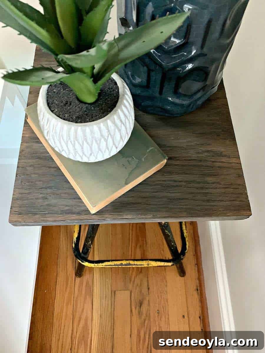 stool upcycled in to a unique night stand side table