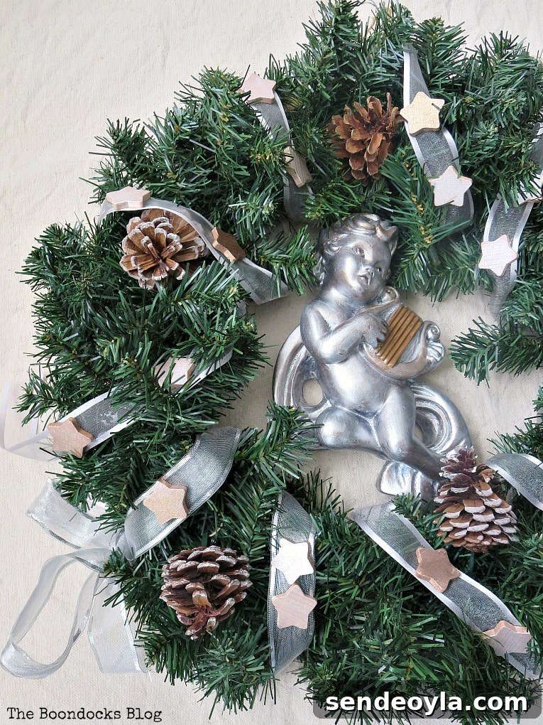 gluing the wood stars to ribbon