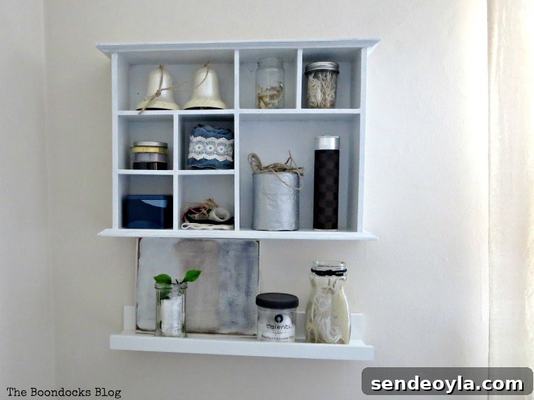 How to Create a Calm Bedroom: Serene Decor Ideas 7 Ikea picture ledge below a wall mounted storage caddy, How to Create a Calm Look for a Bedroom www.theboondocksblog.com