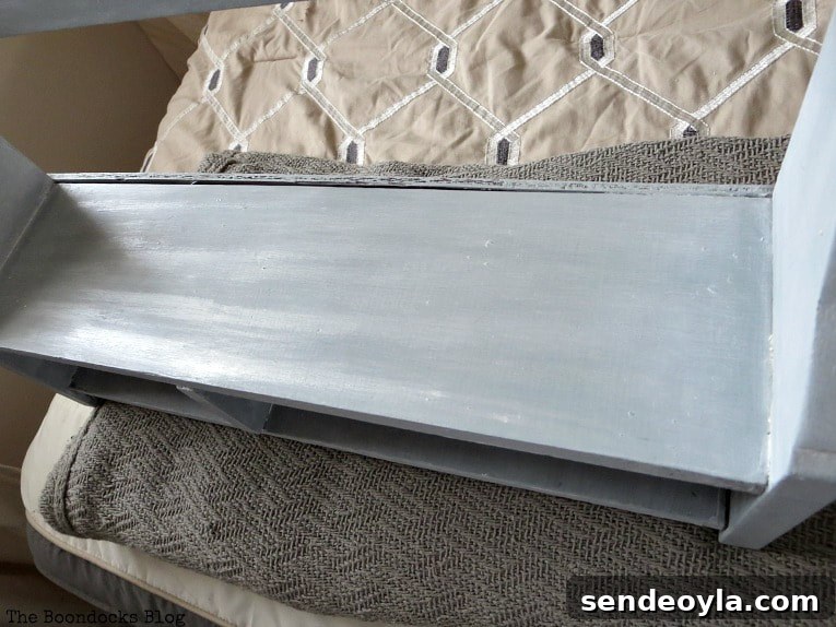 How to Add a Metallic Finish to a Painted Wood Shelf 8 Top view of wood shelf with strips of shimmer, A Super Easy Way to Add Shimmer to a Shelf, theboondocksblog