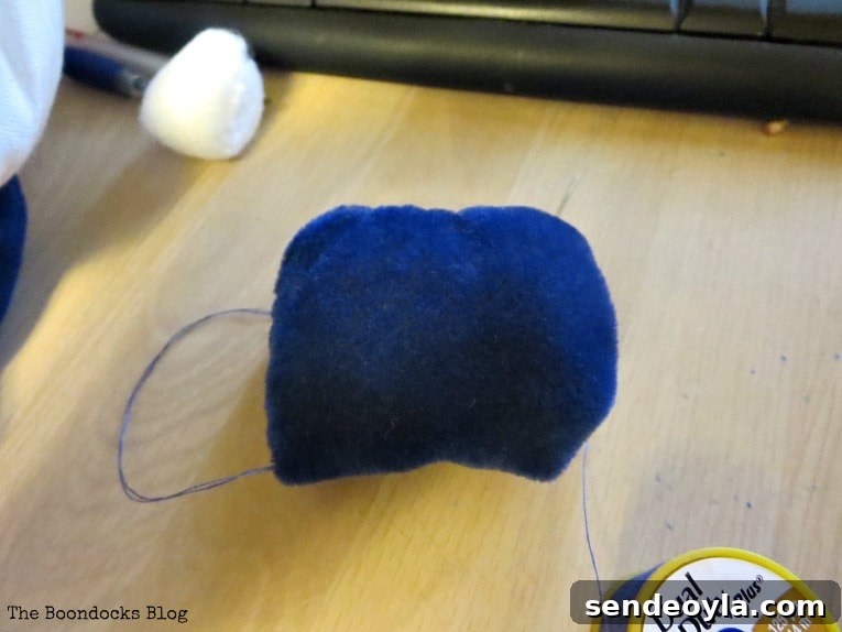 DIY Gnome Making Mistakes to Avoid 12 making the hands and feet of the gnome with velvet fabric