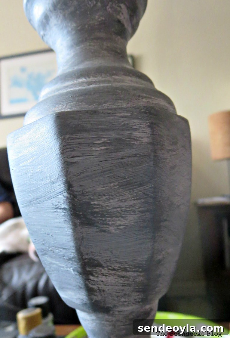 Turn a Lamp Base Into Faux Stone with Paint 8 Close up process of painting the lamp base.