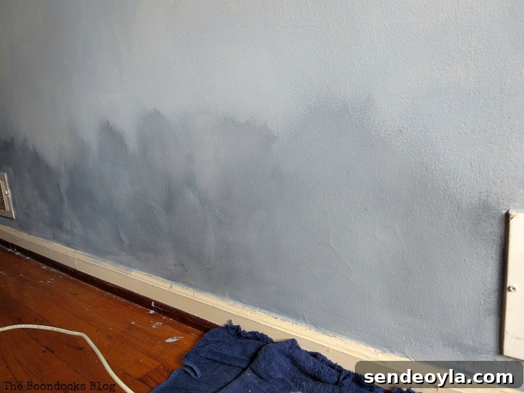 How to Paint a Cloud Accent Wall: DIY Step-by-Step Guide 13 The bottom portion of the wall with the cloudy effect.