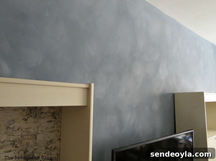 How to Paint a Cloud Accent Wall: DIY Step-by-Step Guide 16 Side angle view of the accent wall with cloudy effect