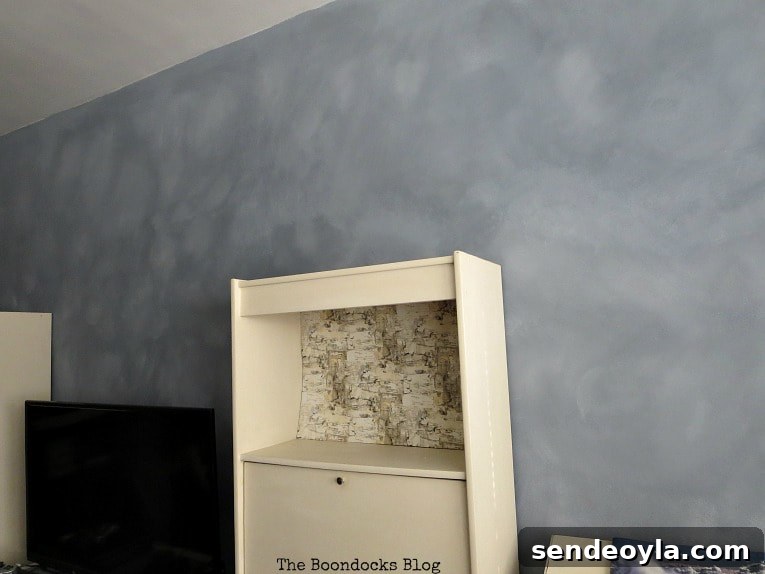 How to Paint a Cloud Accent Wall: DIY Step-by-Step Guide 17 Accent wall with cloudy effect.