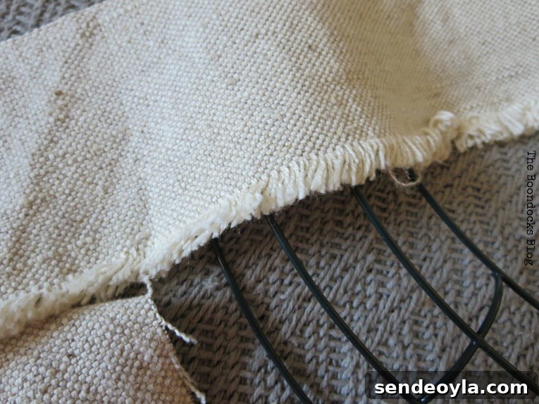 DIY Dollar Store Fall Wreath: Step-by-Step Guide 6 Close up of the frayed edges of strips of fabric.
