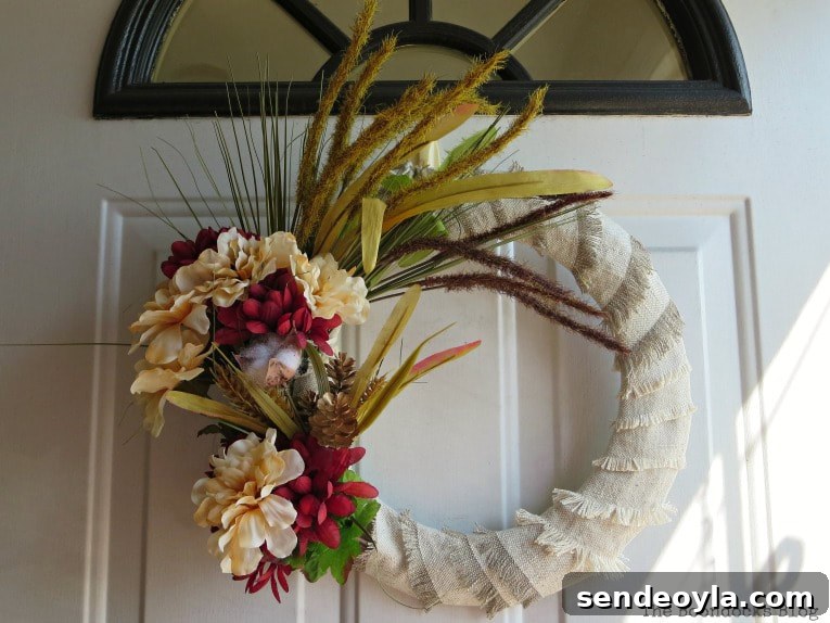DIY Dollar Store Fall Wreath: Step-by-Step Guide 9 Hanging the fall wreath on the front door.