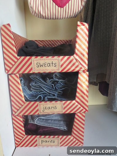 DIY Cardboard Paper Organizer for Your Desk 16 Three boxes stacked to organize clothes.