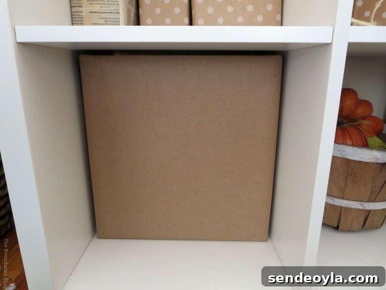 DIY Cardboard Paper Organizer for Your Desk 7 Close up of a cardboard paper organizer storage cube.