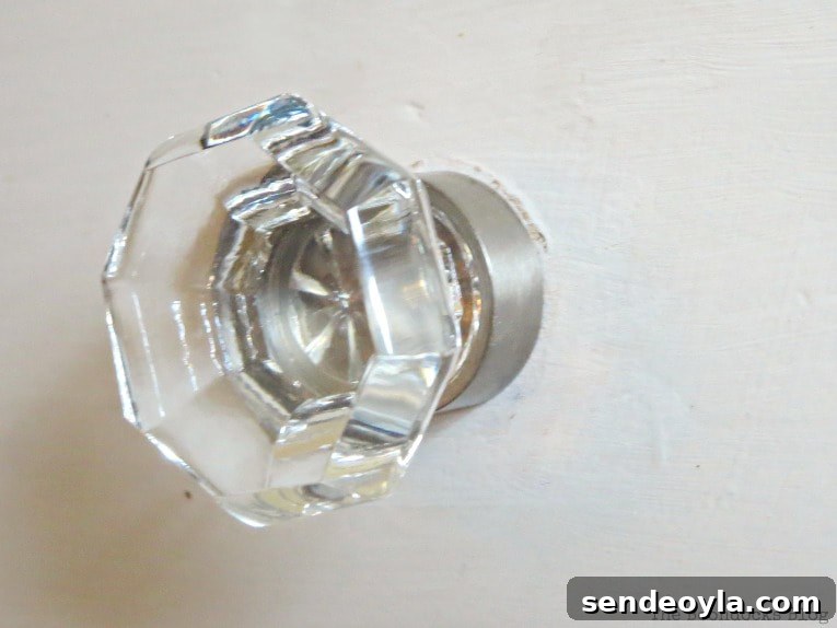 How to Make Furniture Shine with Crystal Dresser Knobs 9 close up of glass knob with nickel base, How to Make your Dresser Sparkle with Age www.theboondocksblog.com