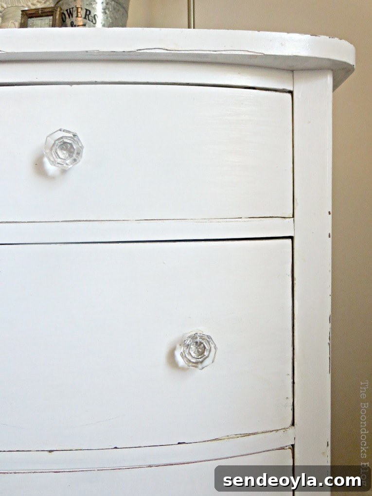 How to Make Furniture Shine with Crystal Dresser Knobs 10 white distressed vintage dresser with glass knobs, #dresser #vintagefurniture #glassknobs #distressedfurniture #bling #shinyknobs How to Make your Dresser Sparkle with Age www.theboondocksblog.com