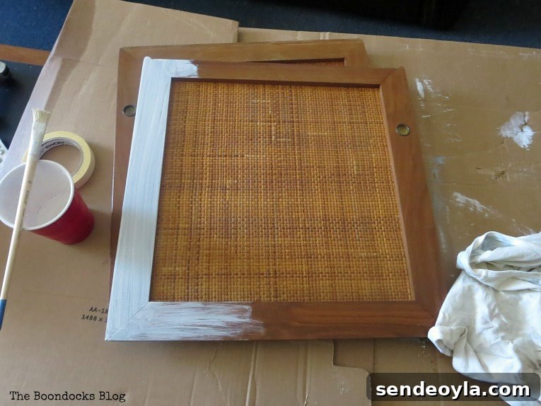 How to Pair Mid-Century Modern Furniture for a Cohesive Look 6 MCM sideboard doors being painted with white, How to Pair MCM Furniture to Get One Unified Look www.theboondocksblog.com