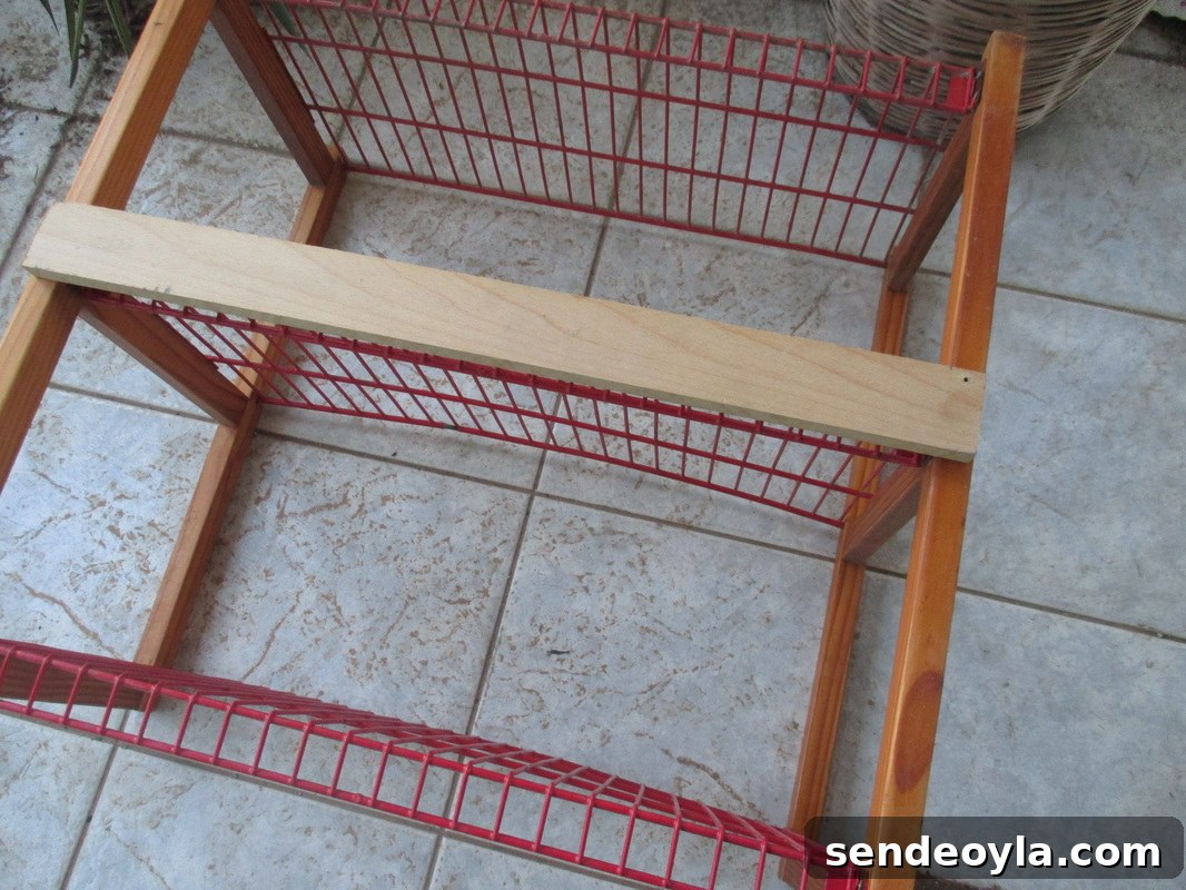 adding wood to the back of the storage unit for support