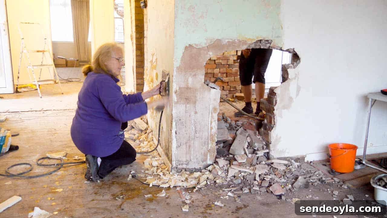 How to Use a Wallpaper Stripper to Remove Old Wallpaper 13 damaged plaster around a fire place