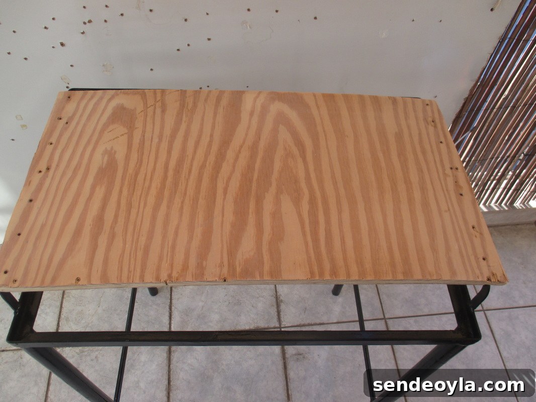 Plywood cut to size, A rusty old Table Revived www.theboondocksblog.com
