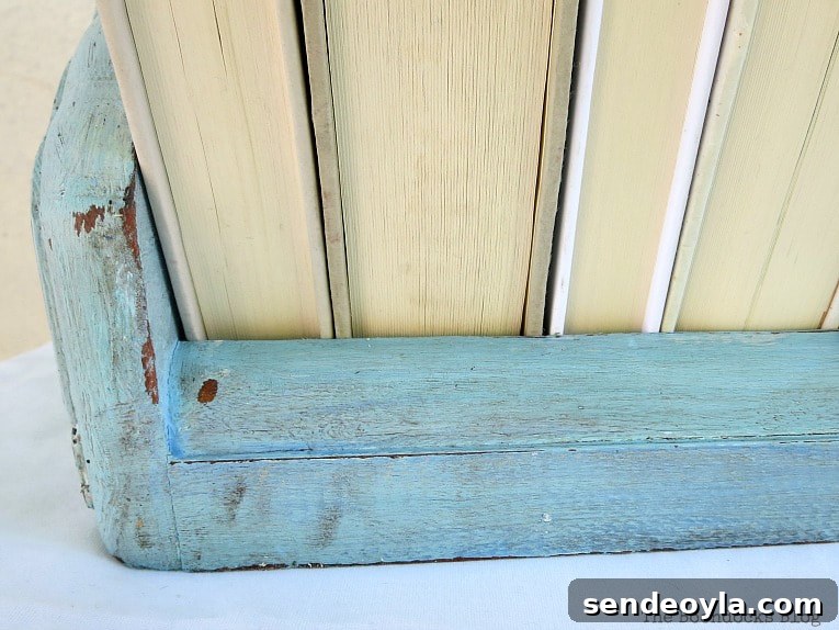 Transform Vintage Book Trough into Stylish Decor 8 corner closeup of the distressing