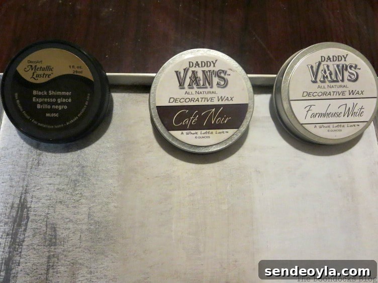 Adding the decorative waxes to see the results. How to Give your Old Table a New Look with Stencils