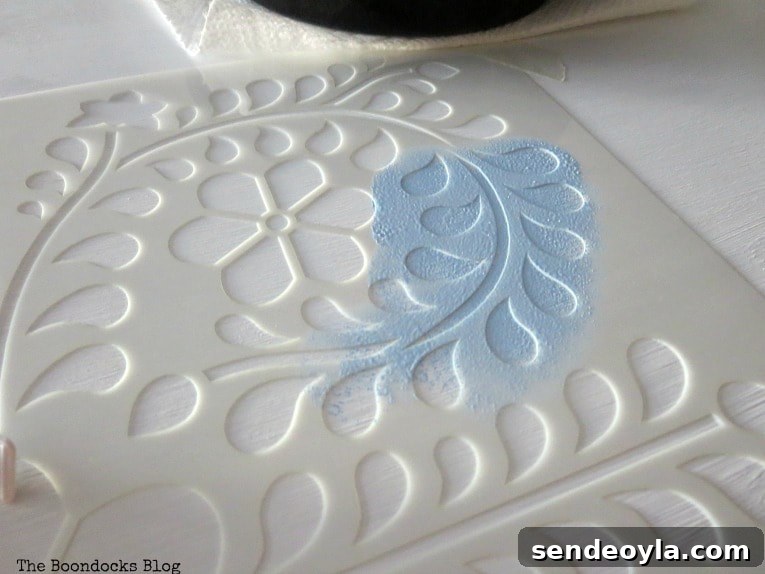 Applying the paint on the stencil, How to Give your Old Table a New Look with Stencils