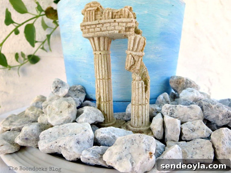 Upcycled Beach Vignette Ideas for Coastal Decor 12 the ruins placed between the pebbles, Using Pebbles to Inspire My Love of the Beach www.theboondocksblog.com