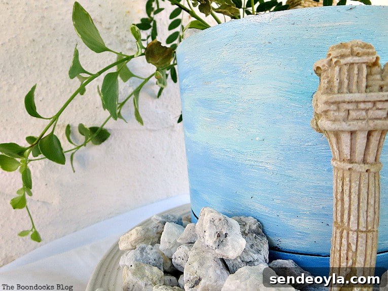 Upcycled Beach Vignette Ideas for Coastal Decor 15 the vine overflowing over the planter, Using Pebbles to Inspire My Love of the Beach www.theboondocksblog.com