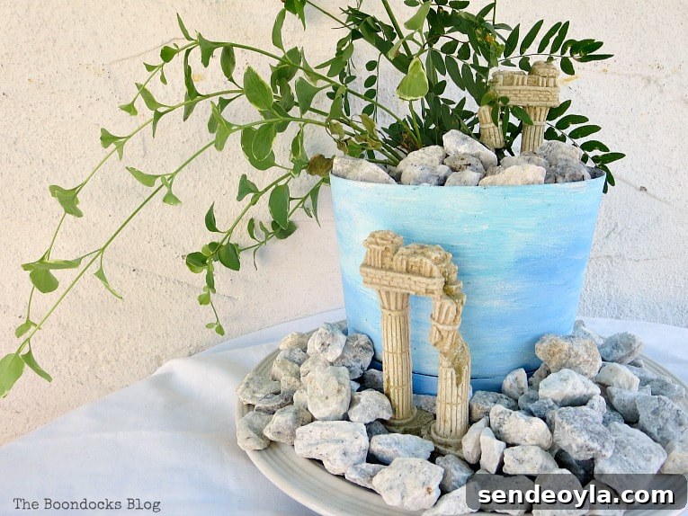 Upcycled Beach Vignette Ideas for Coastal Decor 3 Planter with beach/ancient ruins look, Using Pebbles to Inspire My Love of the Beach www.theboondocksblog.com