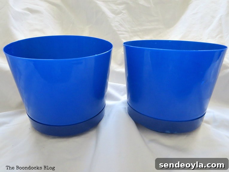 Upcycled Beach Vignette Ideas for Coastal Decor 8 Two plastic planters in blue, Using Pebbles to Inspire My Love of the Beach www.theboondocksblog.com