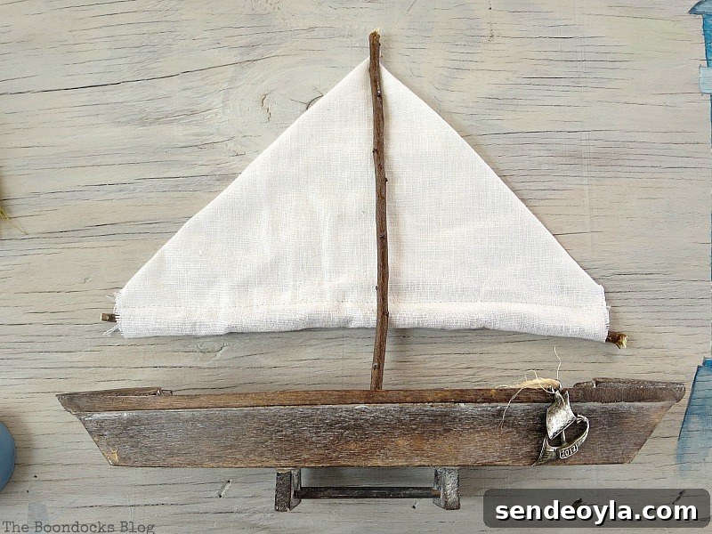 Coastal Wall Art Made from Repurposed Beach Finds 10 Sails made from fabric and twigs