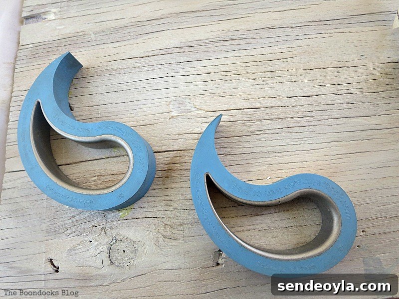 Coastal Wall Art Made from Repurposed Beach Finds 5 Two small doorstops to be repurposed as waves