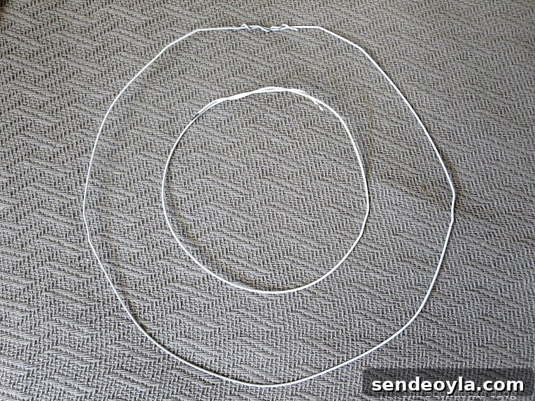 Shaping the wire hangers into circles.