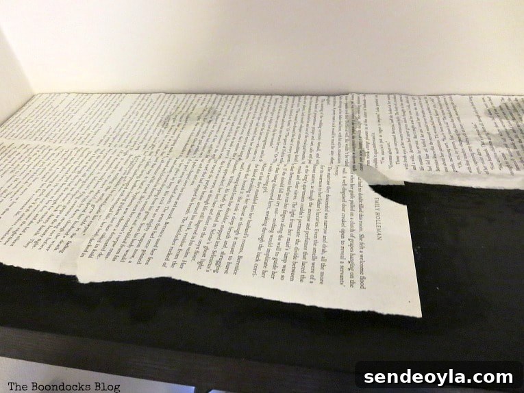 Applying the pages with mod podge