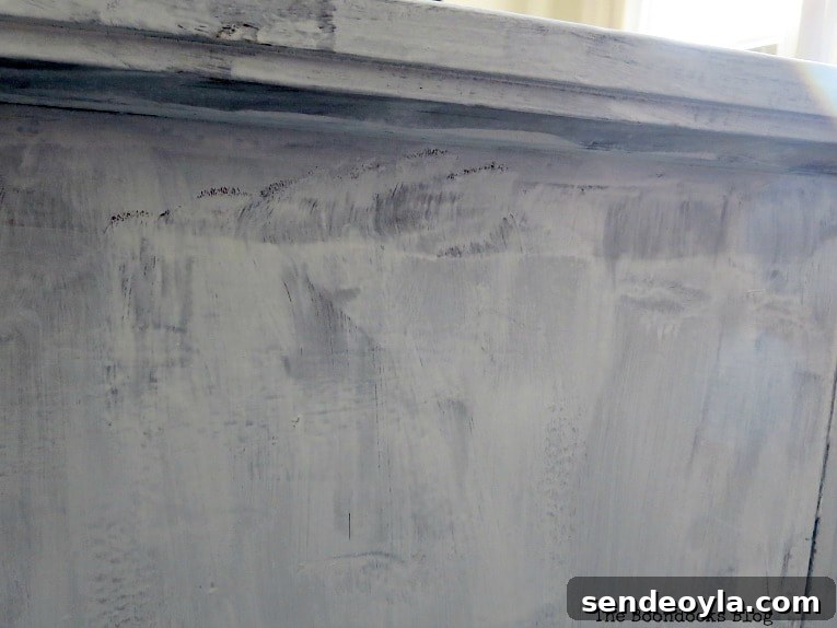 Paint and Restore a Vintage TV Cabinet: DIY Guide 11 side painted with thin brush and bad brush strokes, How to Revive a Vintage TV Cabinet www.theboondocksblog.com