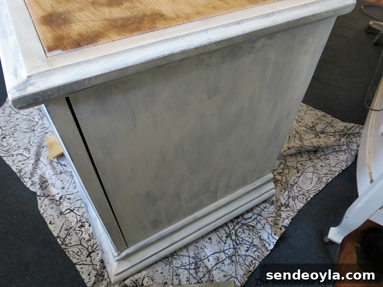 Paint and Restore a Vintage TV Cabinet: DIY Guide 7 Painting the side with milk paint, How to Revive a Vintage TV Cabinet www.theboondocksblog.com