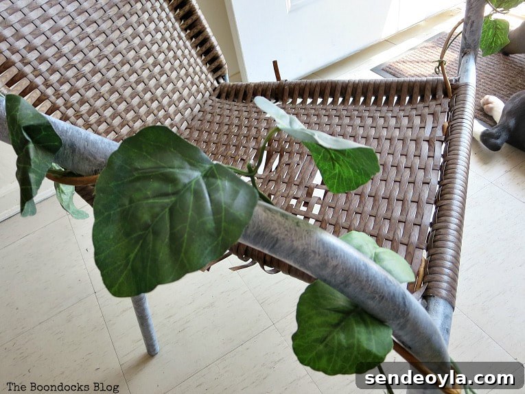 DIY Repair and Repurpose a Torn Rattan Chair 5 Painted metal on rattan chair with faux vines wrapped around the frame