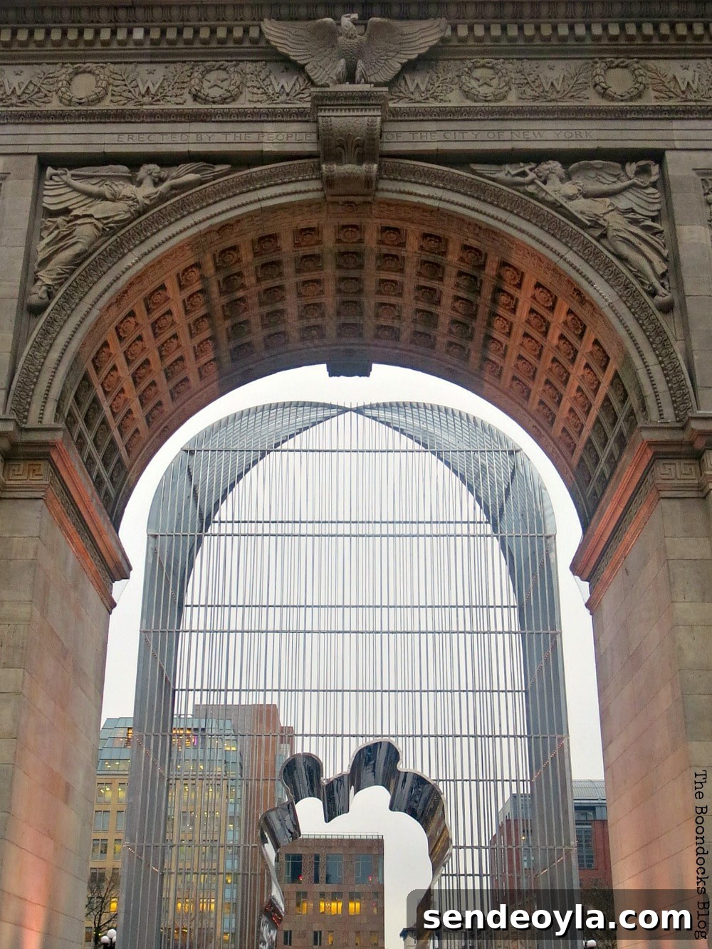 Explore Greenwich Village: Iconic Sights and Hidden Gems 15 Metal frame exhibition below arch, Interesting things to see in Greenwich Village