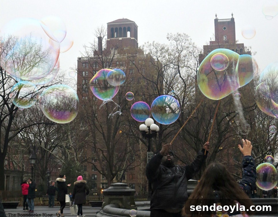 Man blowing bubbles in Washington Square Park, Interesting things to see in Greenwich Village