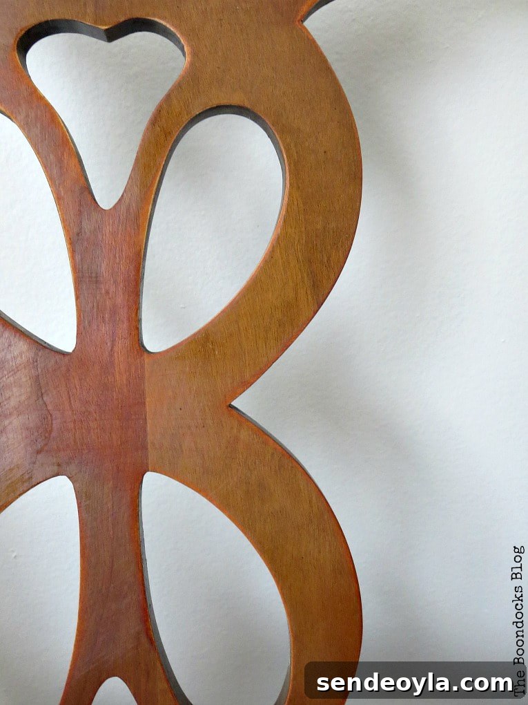 DIY: Turn One Chair Into Two Distinct Makeovers 9 Detail of finished wood chair, #Chairmakeover #Upcycledchair #Chalkytypepaint #Uniquelookforchair #upcycledclothes How to Get Two Unique Makeovers from One Chair www.theboondocksblog.com
