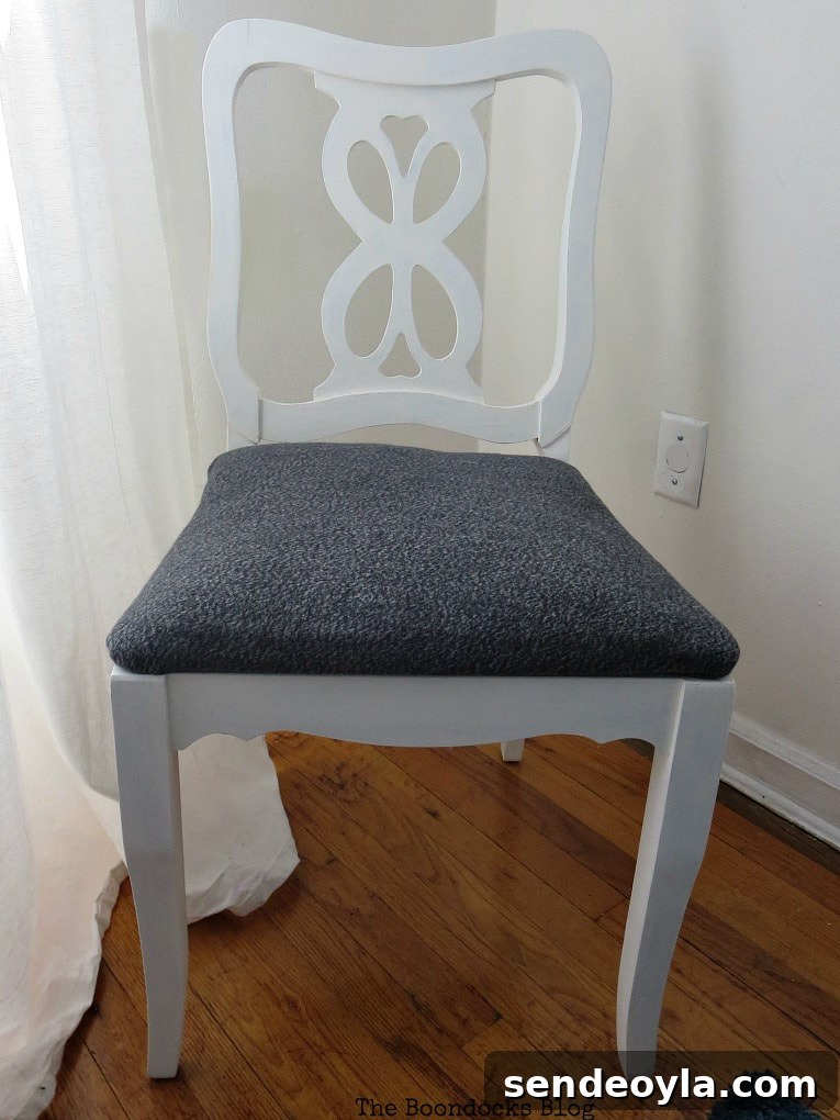 DIY: Turn One Chair Into Two Distinct Makeovers 7 Finished Chair with white frame, #Chairmakeover #Upcycledchair #Chalkytypepaint #Uniquelookforchair #upcycledclothes How to Get Two Unique Makeovers from One Chair www.theboondocksblog.com